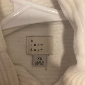 White Mock neck sweater